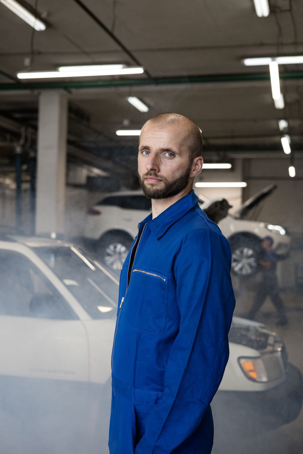 Representative photo of a worker in a blue work coverall