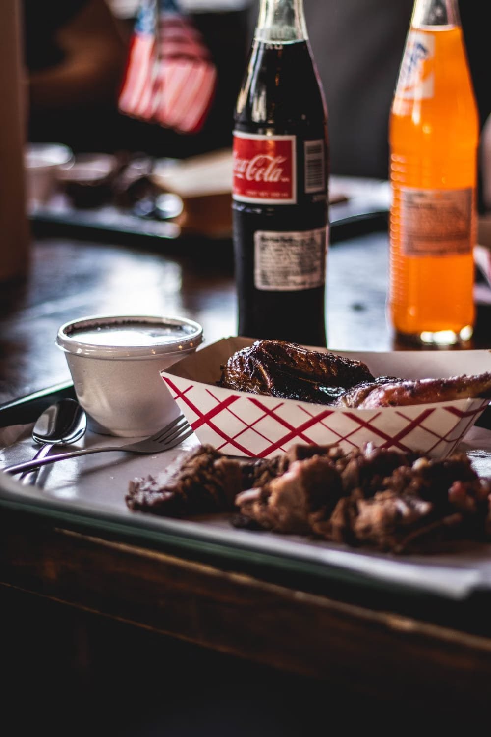 Texas barbecue plate served with a cold drink