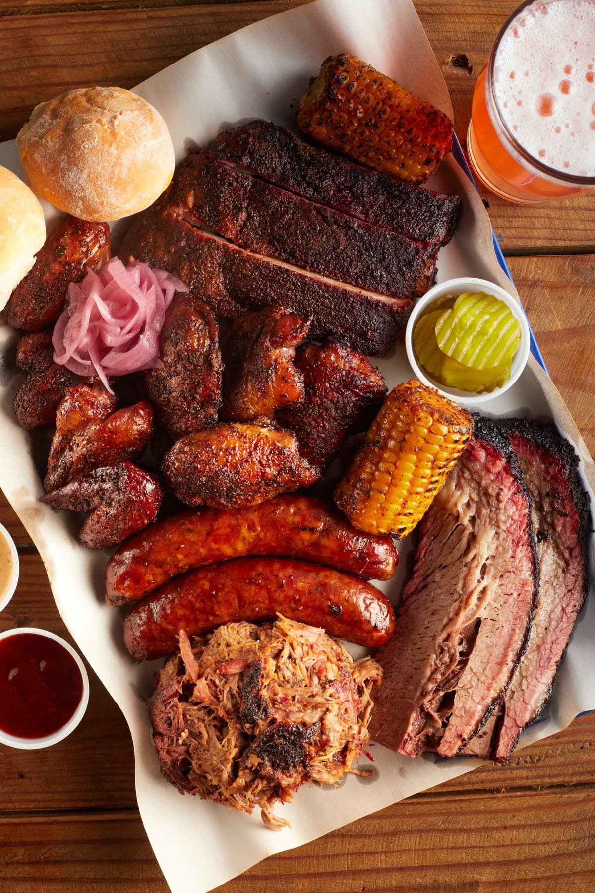 Barbecue platter with sausage, brisket and sides for a group order