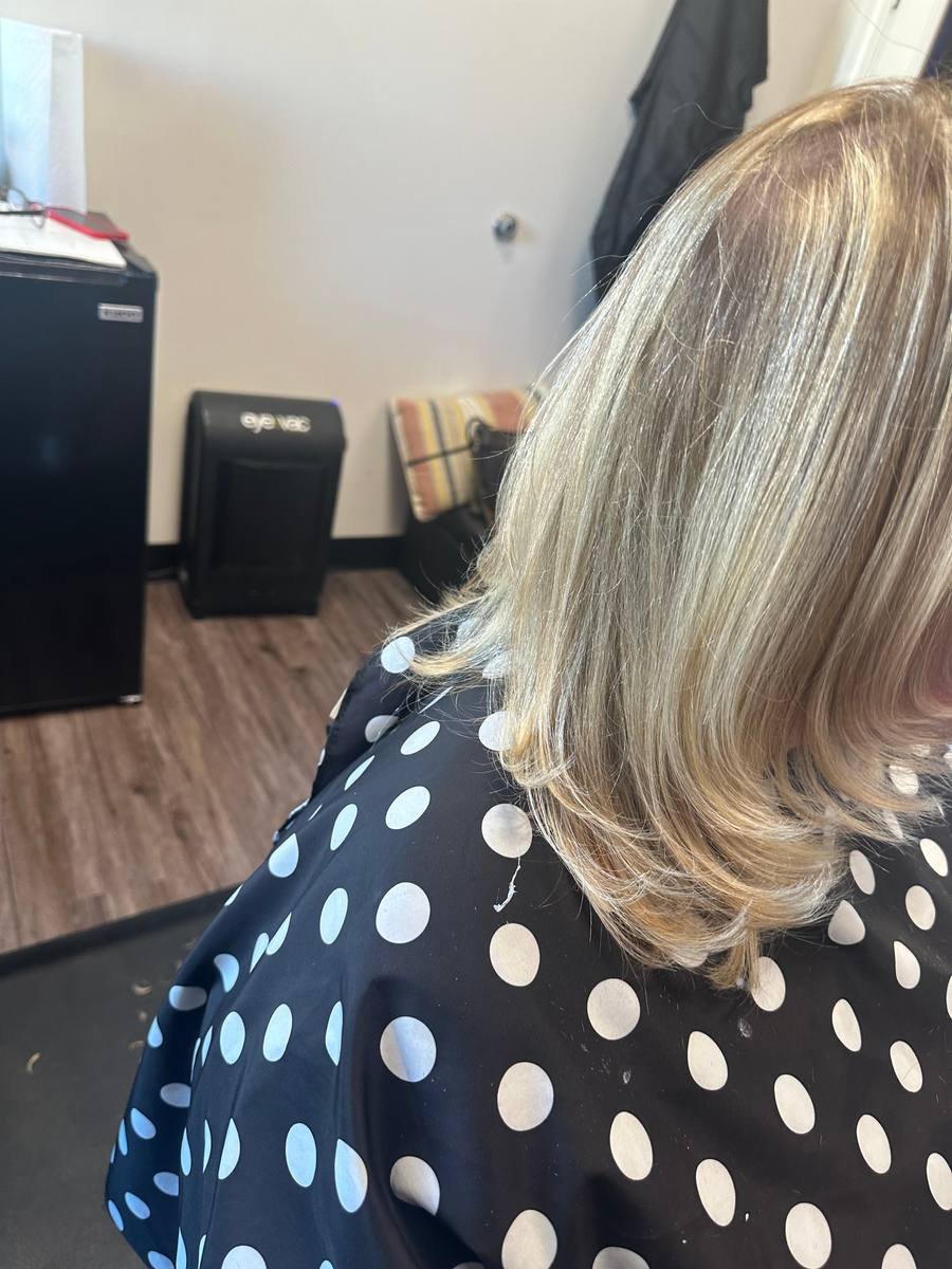 Soft silver-blonde highlights finished with a rounded flip