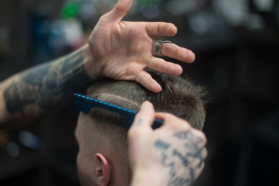 Precision fade haircut at Fanatics Barbershop Pearland TX