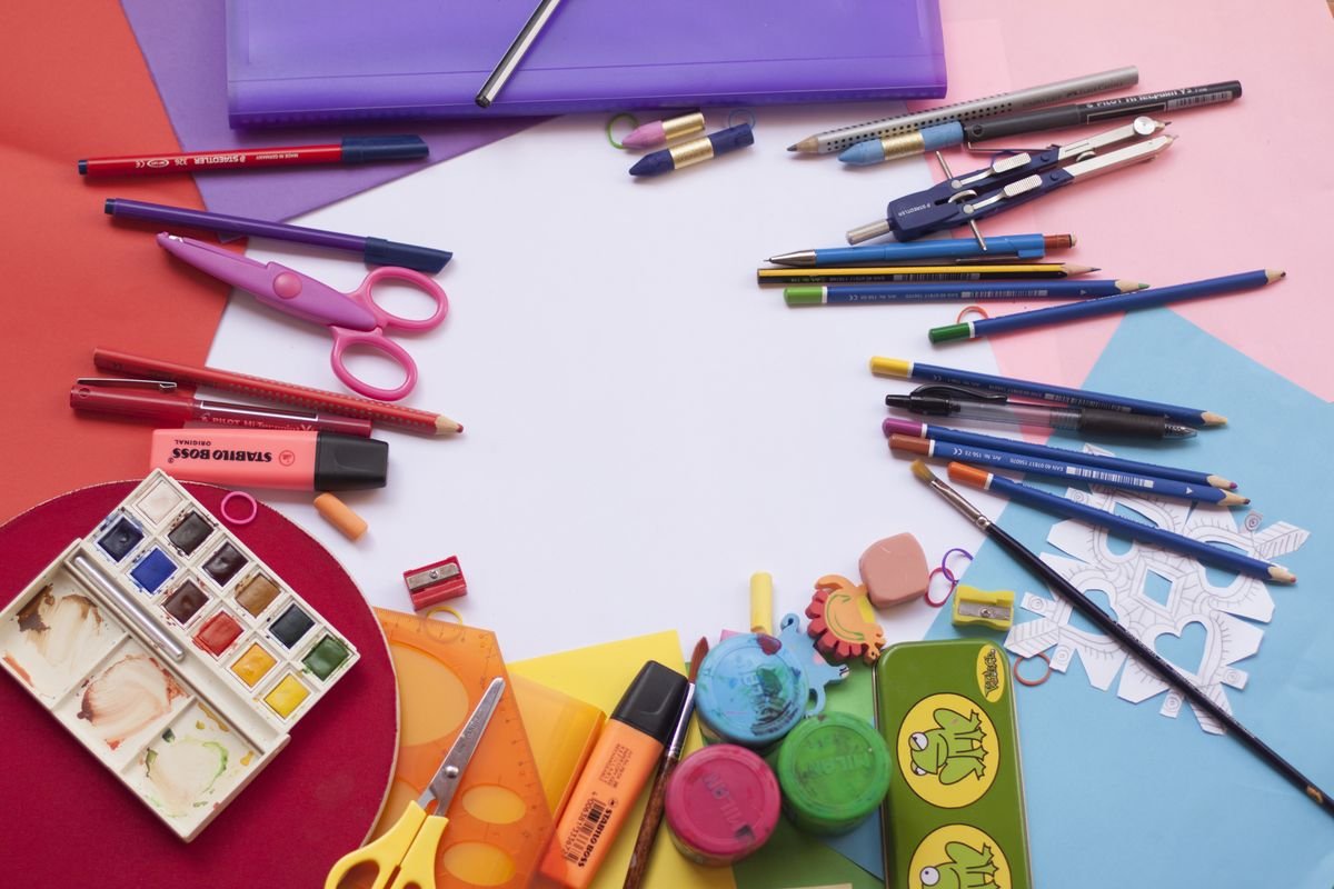 Representative photo of colorful preschool art and craft supplies laid out on a table