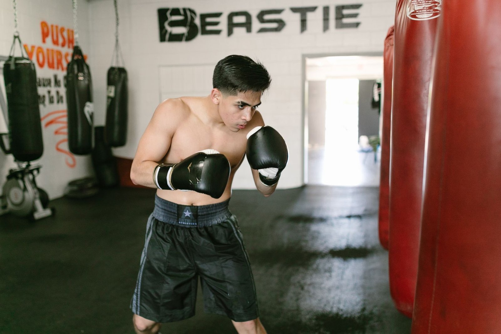 Boxer training in a real boxing gym