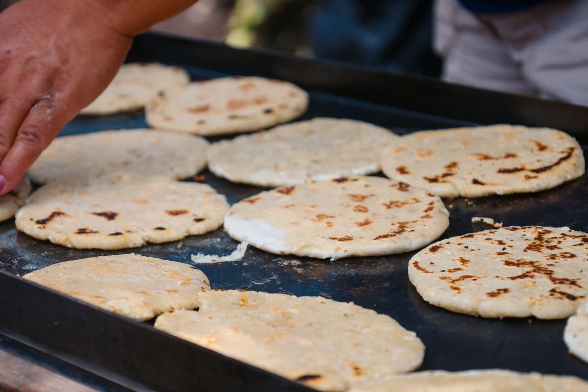 Representative photo of pupusas on the hot griddle