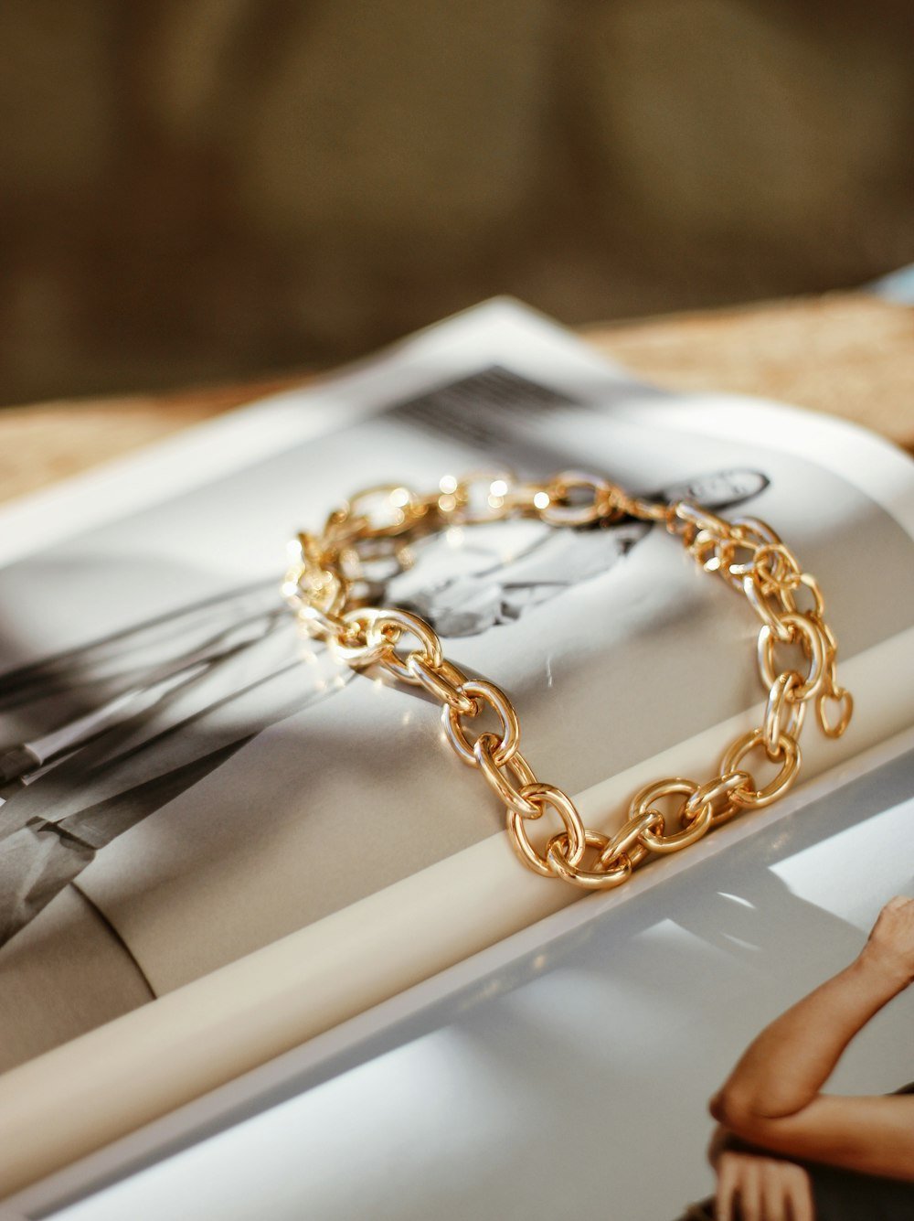 Representative photo of a gold chain-link bracelet — client inventory swaps in
