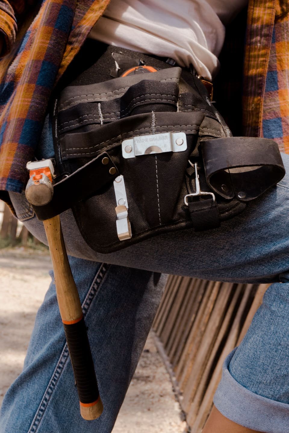 Close-up of a fully stocked technician tool belt used by The Appliance Plug