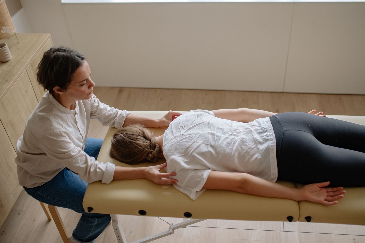 Representative photo of a patient resting comfortably on a treatment table during gentle chiropractic care